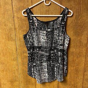 Black and white rayon sleeveless with metal neck and arm hole detailing
